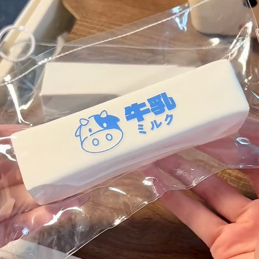 Soft cream-like texture milk strip taba squishy toy