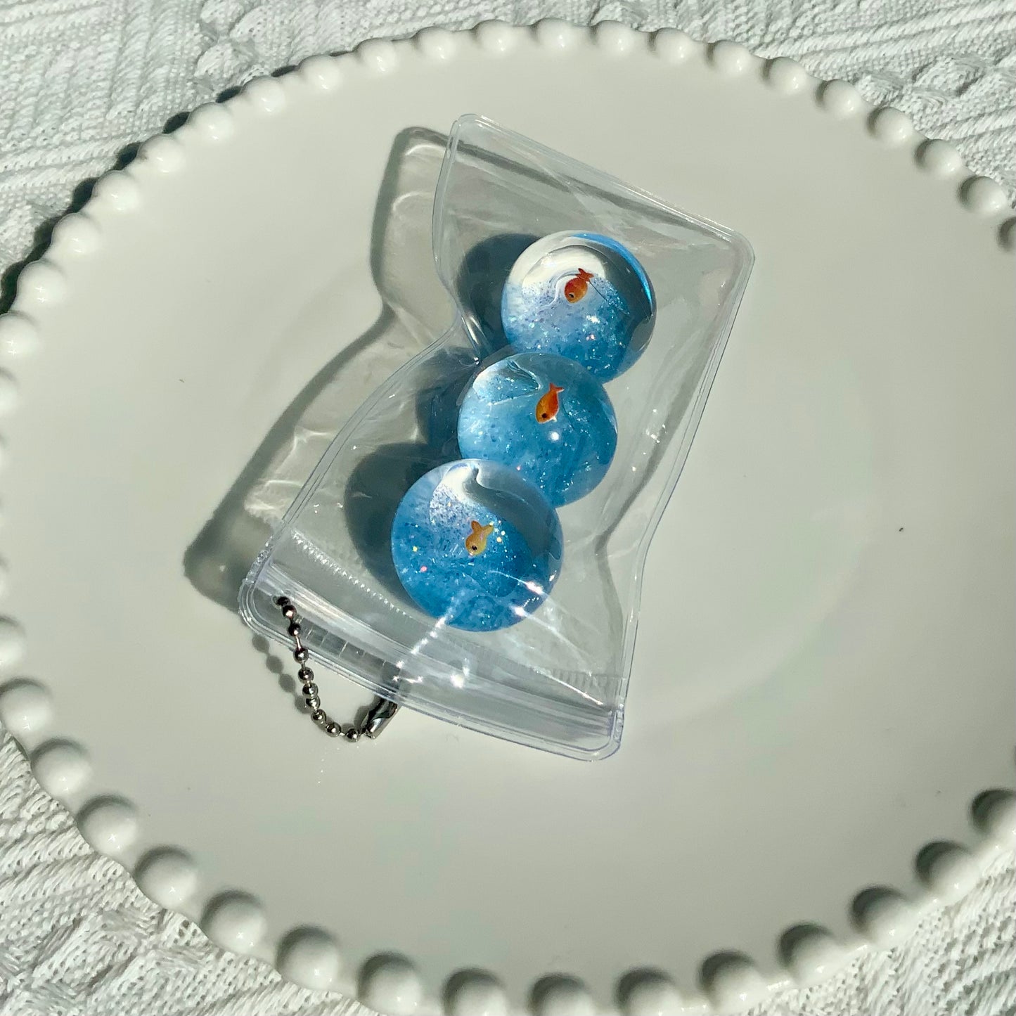 Little fish ocean planet taba squishy toy pendant