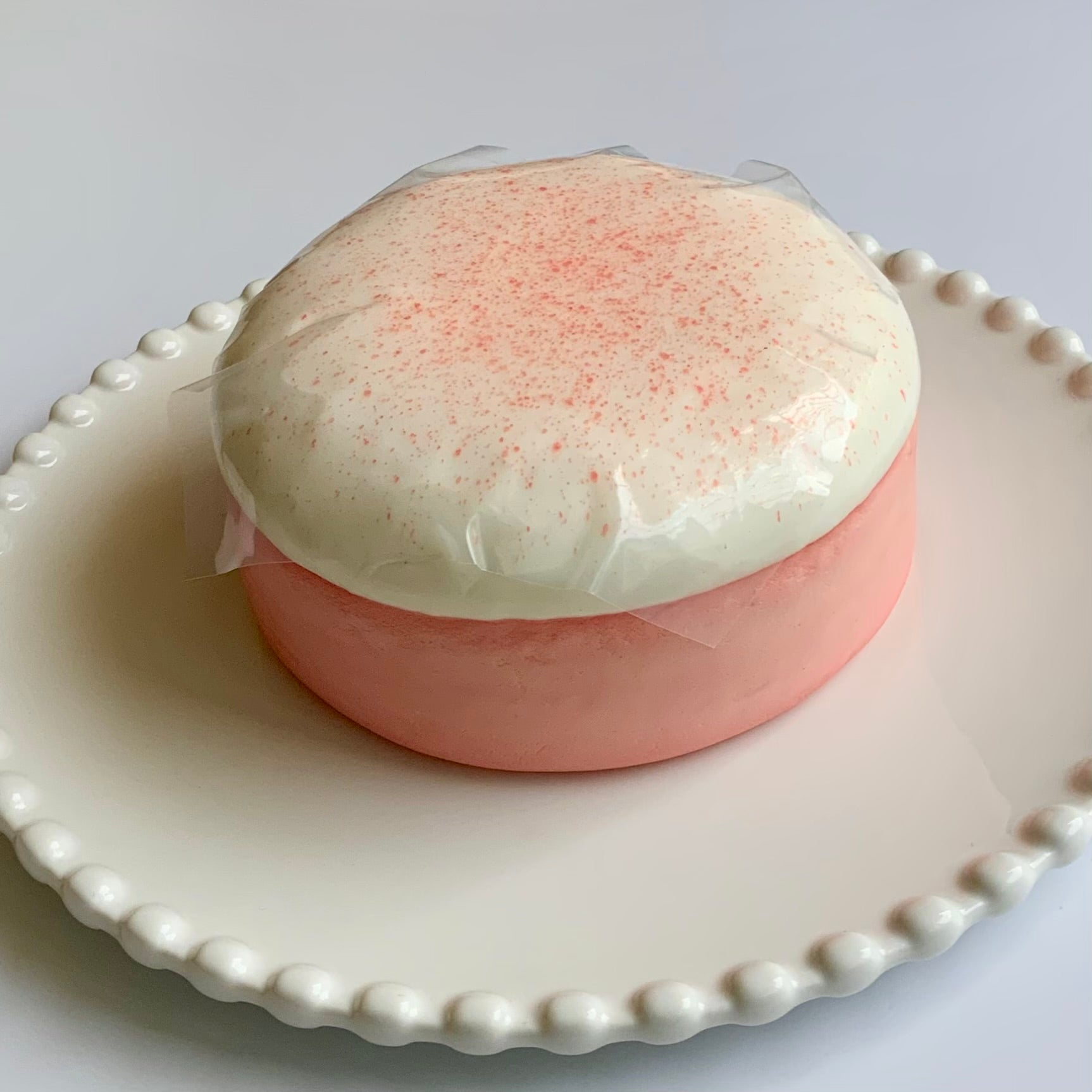 White peach cake roll & Oreo chocolate cake basque sticky slow rising squishy toy - Charming Cheese