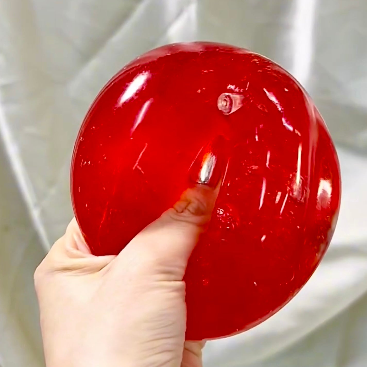 Formable red / golden creamy texture big apple 🍎 stress ball - Charming Cheese