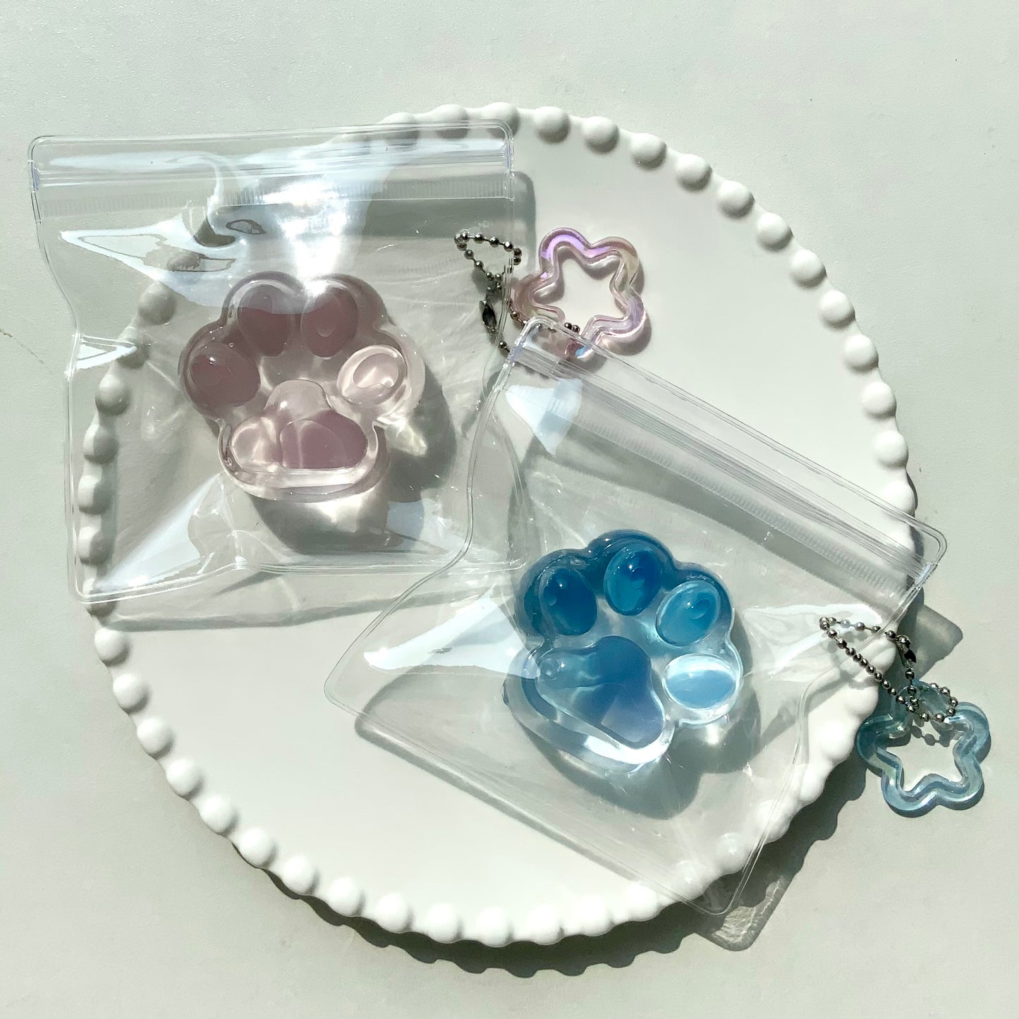 Sea salt/ peach transparent cat paw 🐾 taba squishy toy