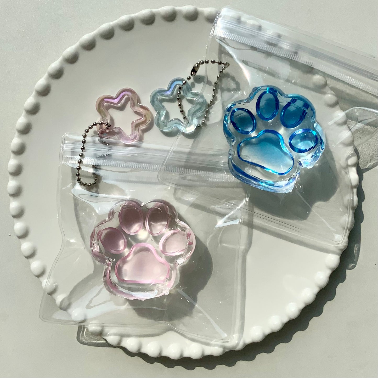 Sea salt/ peach transparent cat paw 🐾 taba squishy toy