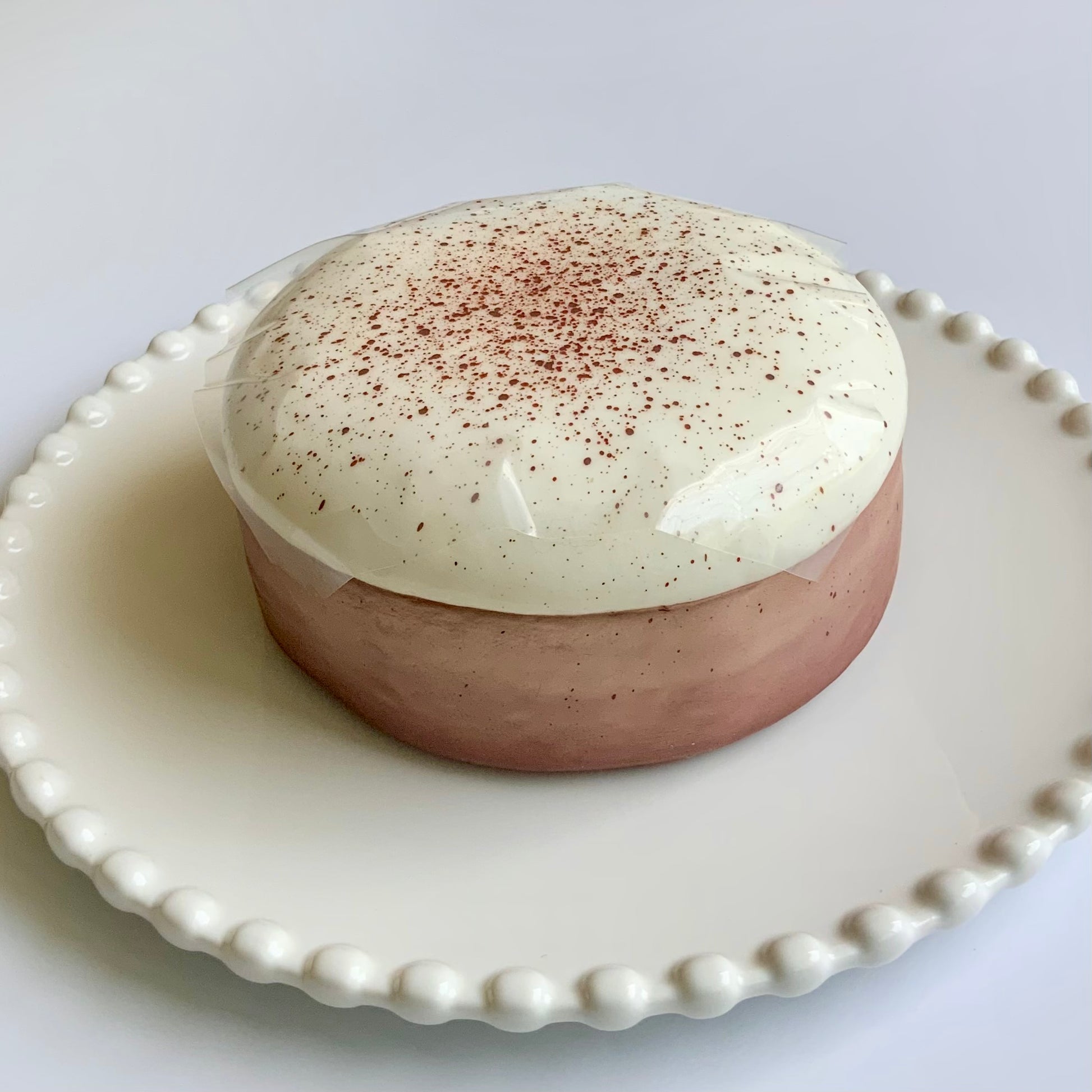 White peach cake roll & Oreo chocolate cake basque sticky slow rising squishy toy - Charming Cheese