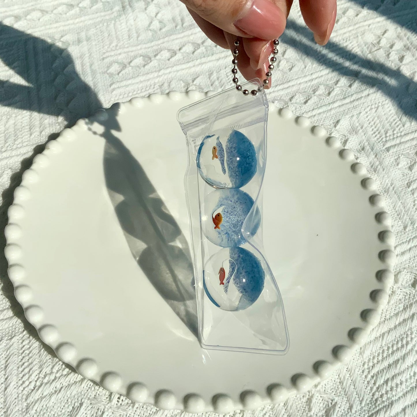 Little fish ocean planet taba squishy toy pendant