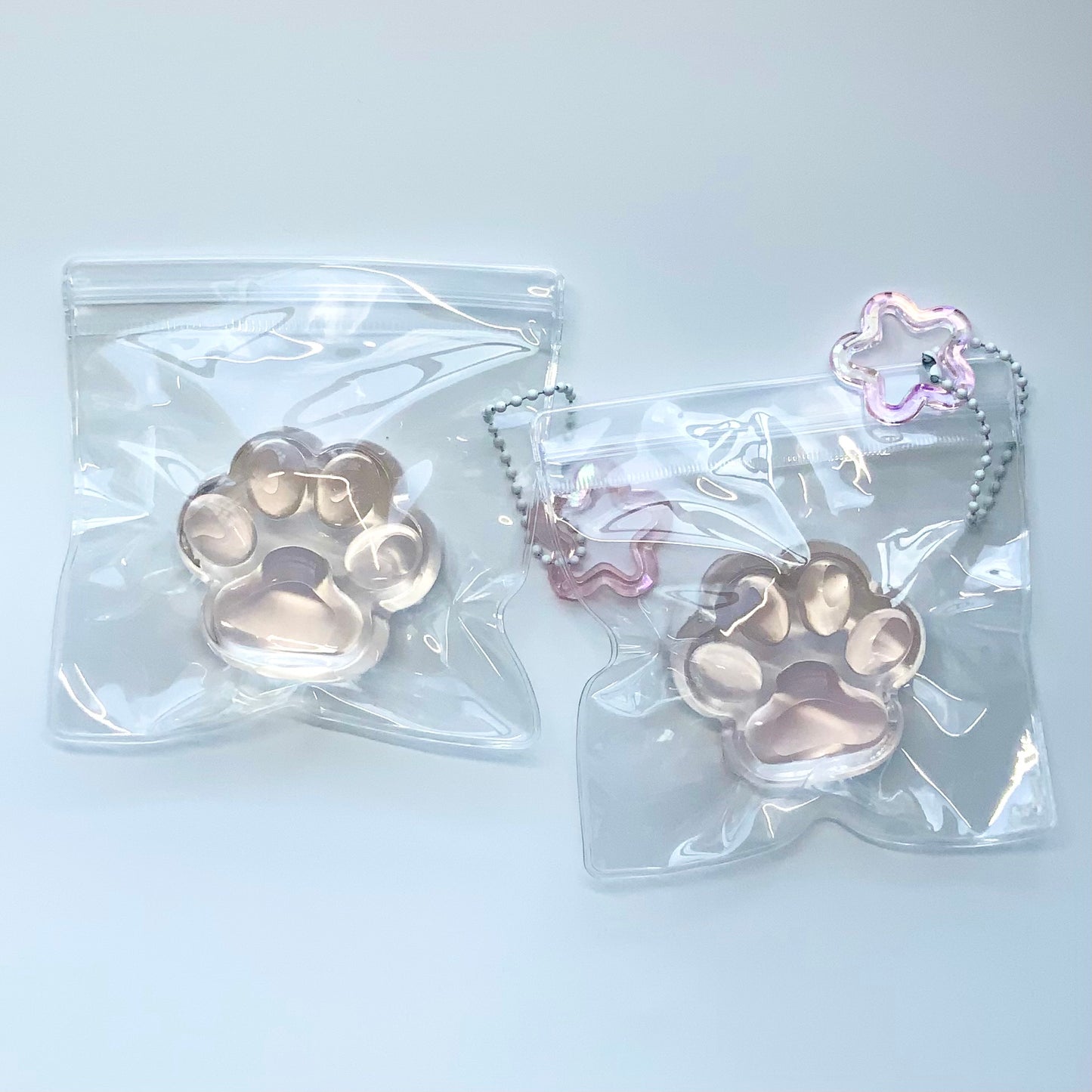 Sea salt/ peach transparent cat paw 🐾 taba squishy toy
