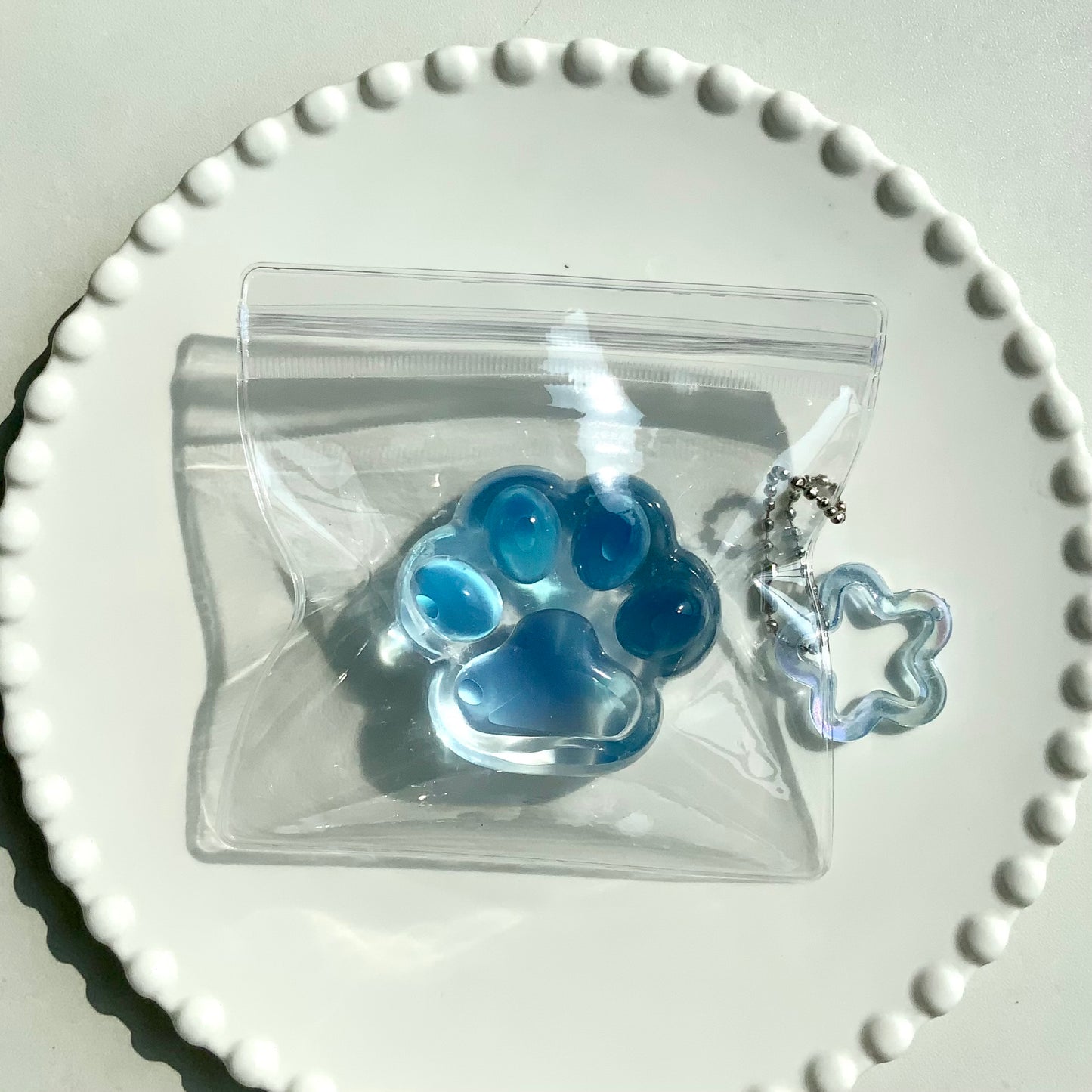 Sea salt/ peach transparent cat paw 🐾 taba squishy toy