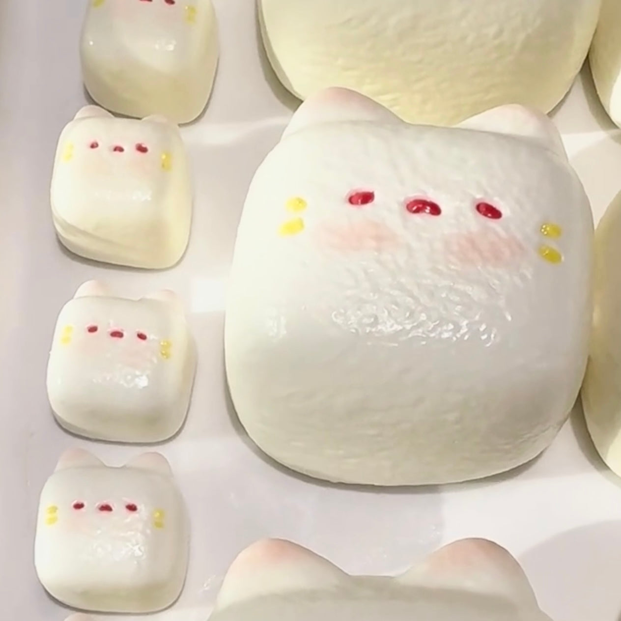 Milk candy cat kitty head water-like texture taba squishy toy (240g)