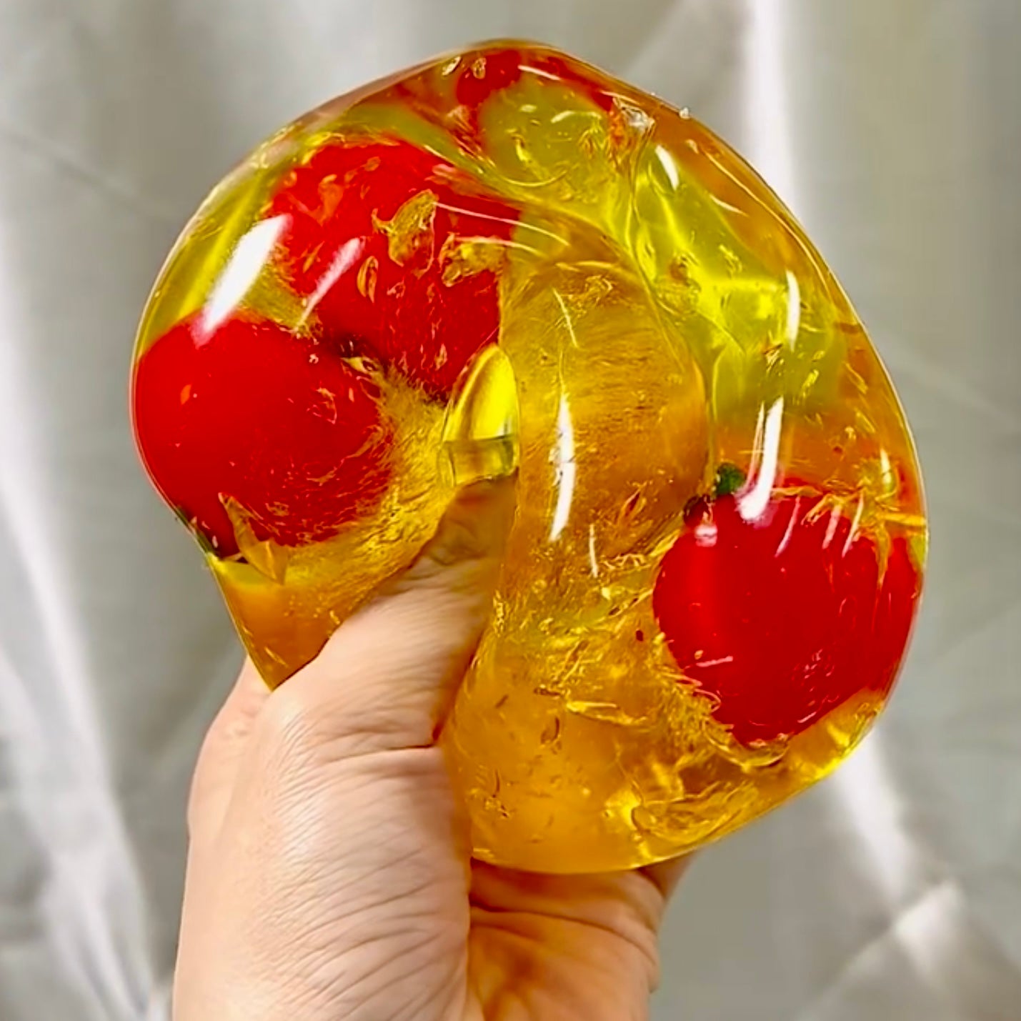 Formable red / golden creamy texture big apple 🍎 stress ball - Charming Cheese