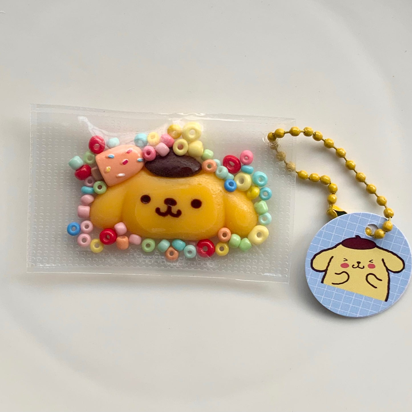 Sanrio Pompompurin taba squishy toy pendant - Charming Cheese