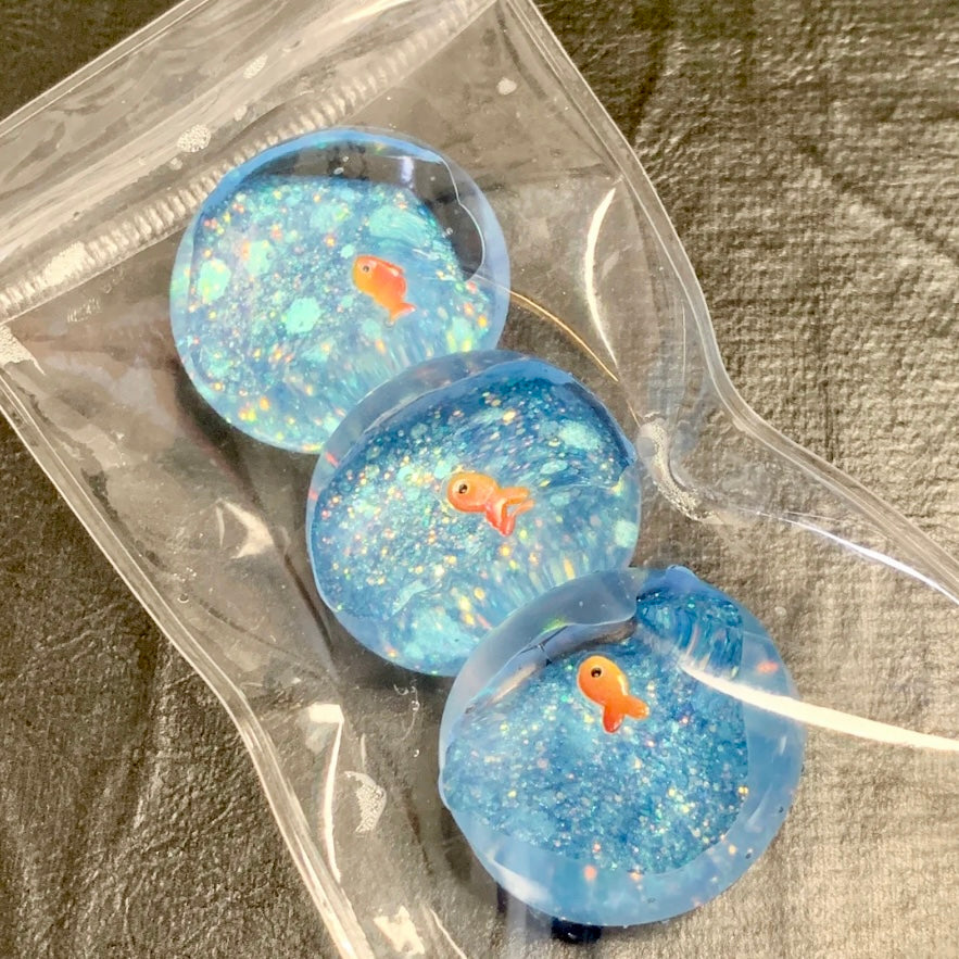 Little fish ocean planet taba squishy toy pendant