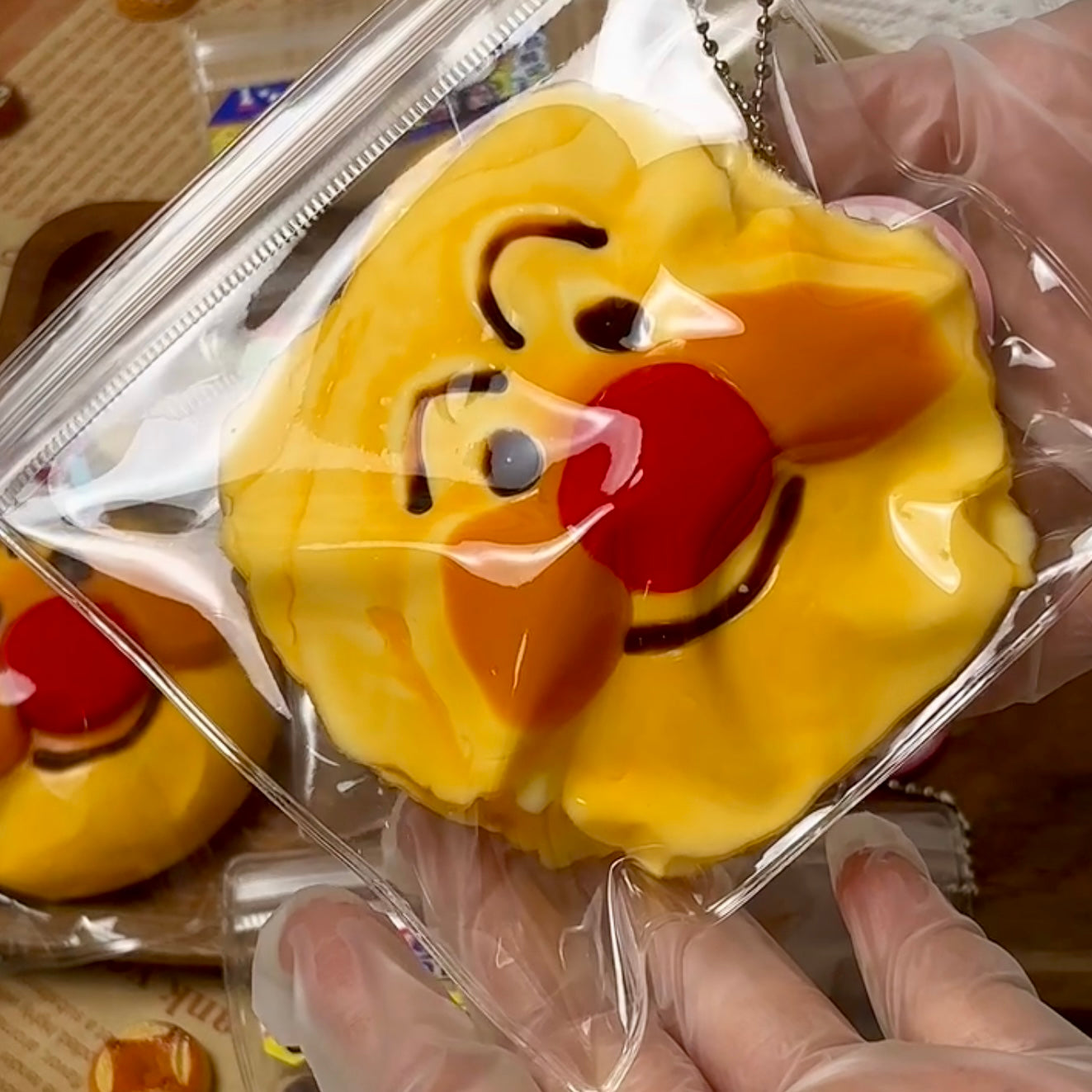 Creamy clay texture burnt yellow Anpanman taba squishy toy - Charming Cheese