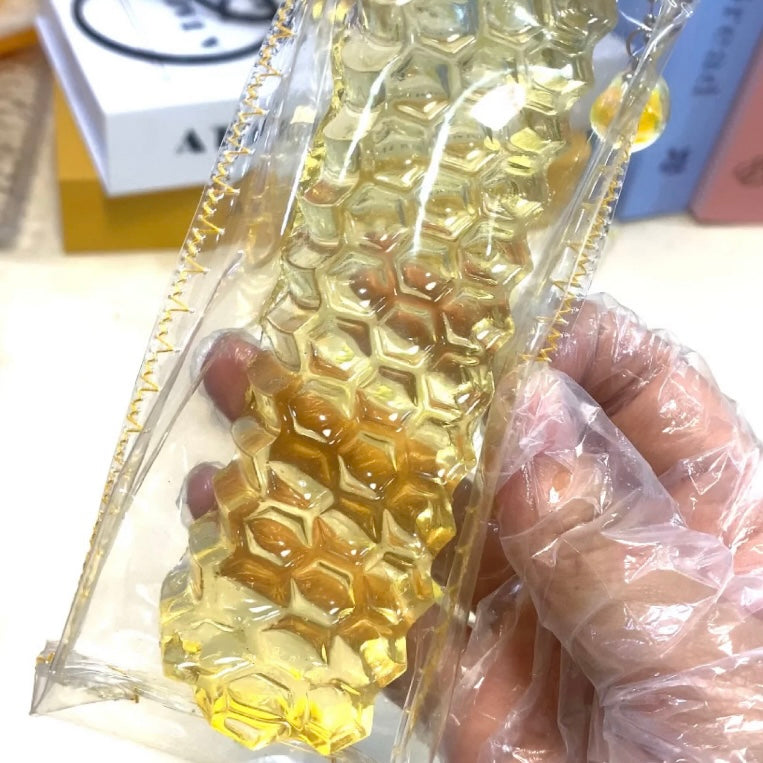 Super Soft Transparent Golden Honeycomb Taba Squishy Toy - Charming Cheese