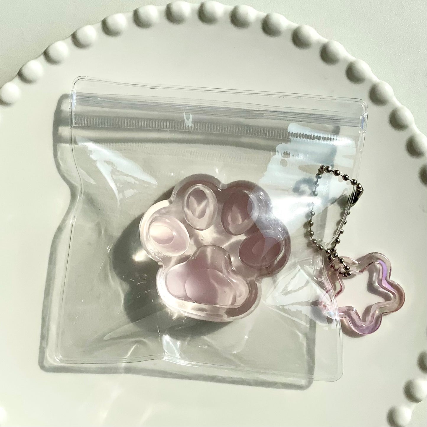 Sea salt/ peach transparent cat paw 🐾 taba squishy toy