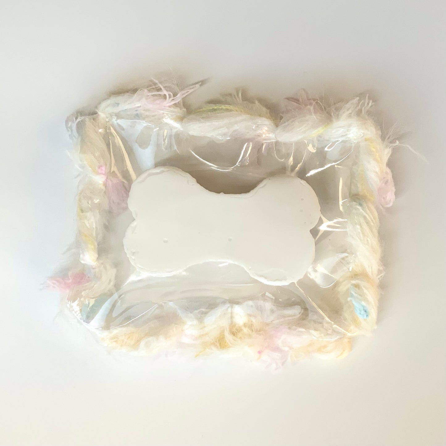 Little shiny bone taba squishy toy