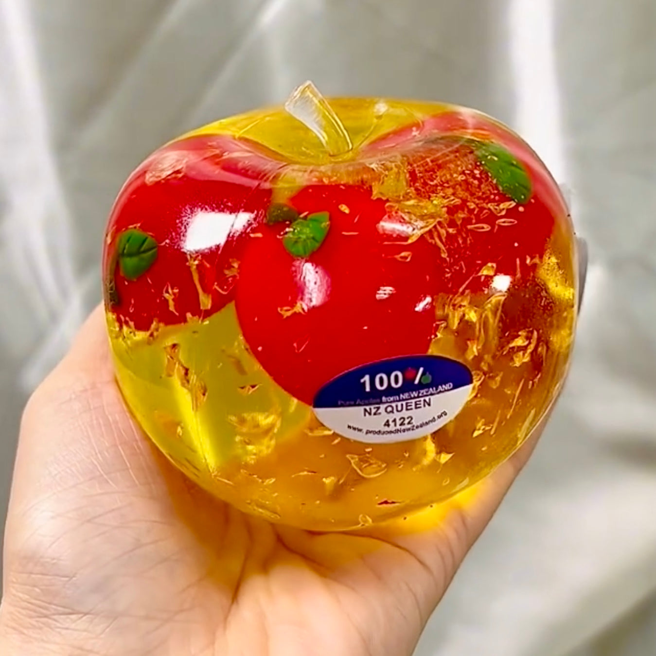 Formable red / golden creamy texture big apple 🍎 stress ball - Charming Cheese