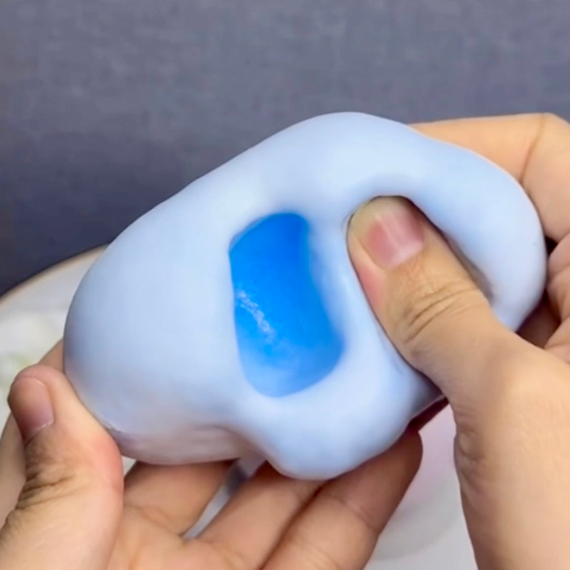 Handmade white thin-skin blue/ pink sand stress ball fidget zip-tie style - Charming Cheese