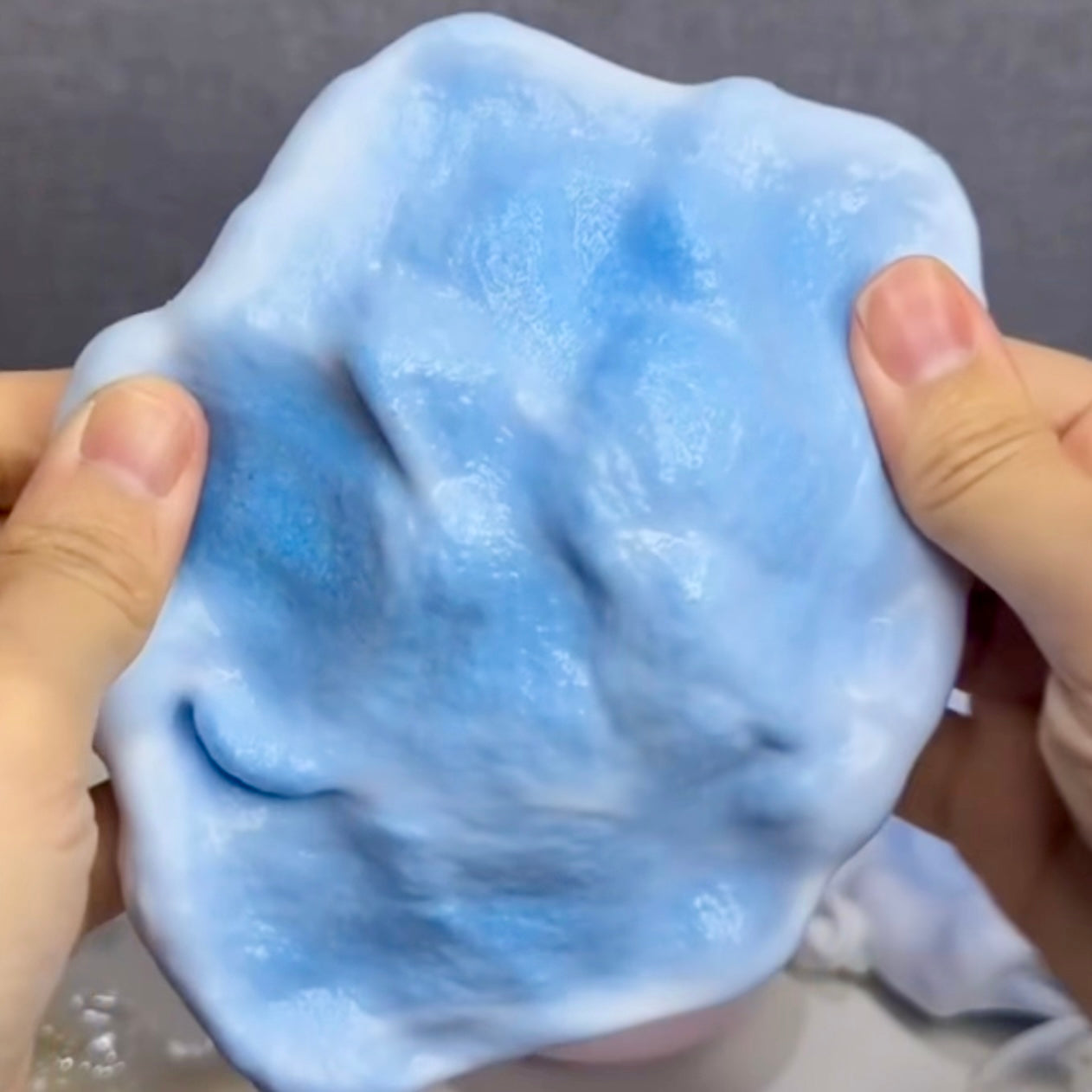Handmade white thin-skin blue/ pink sand stress ball fidget zip-tie style - Charming Cheese