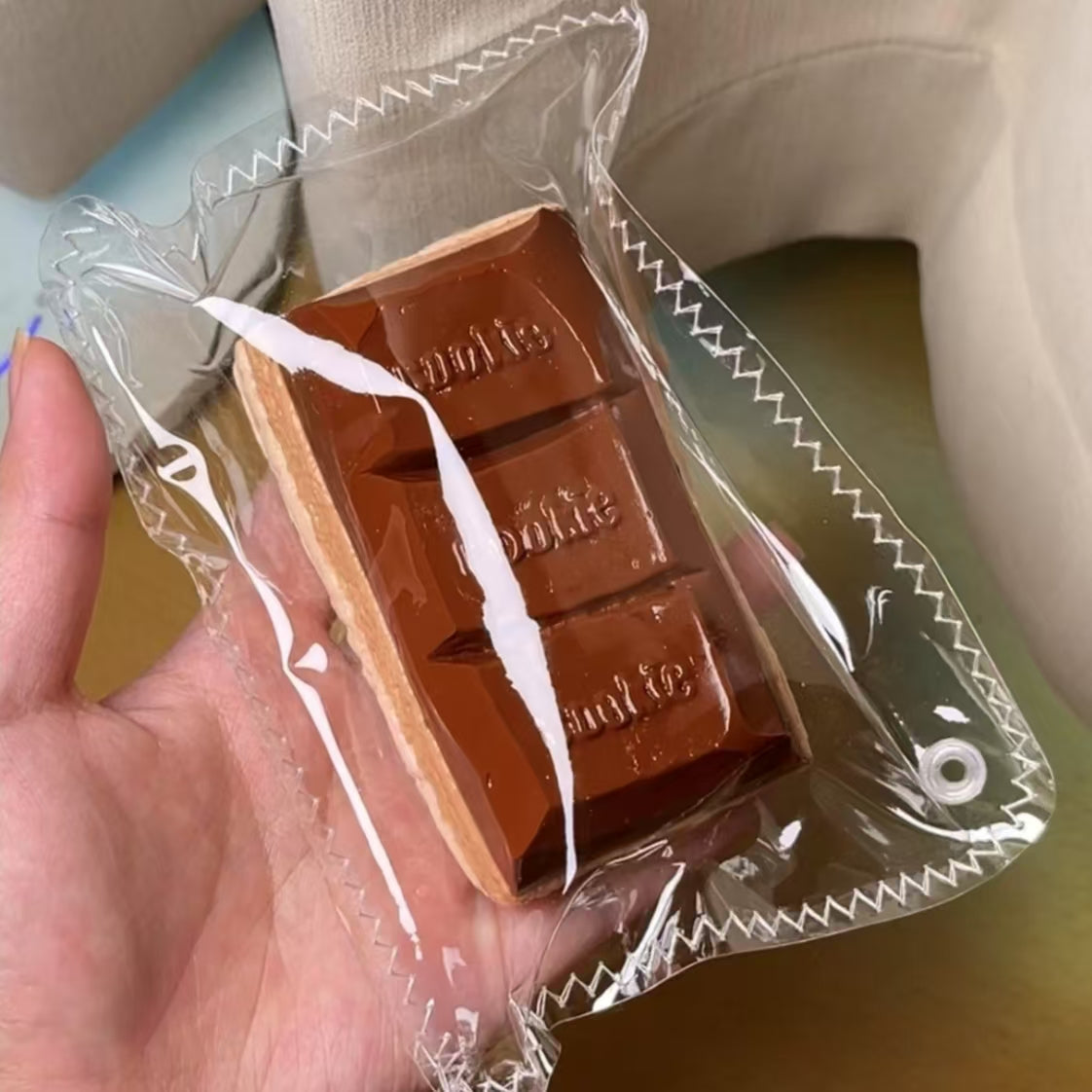 Water-like Texture Bursting Three connected Chocolate Pieces Taba Squishy Toy