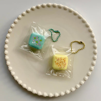 Small Square strawberry/chocolate/yellow/blue taba squishy pendant