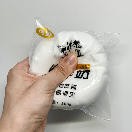 Round bursting pure milk taba squishy toy