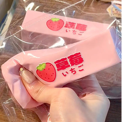Soft cream-like texture strawberry & milk strip taba squishy toy