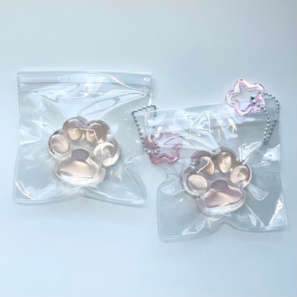 Sea salt/ peach transparent cat paw 🐾 taba squishy toy