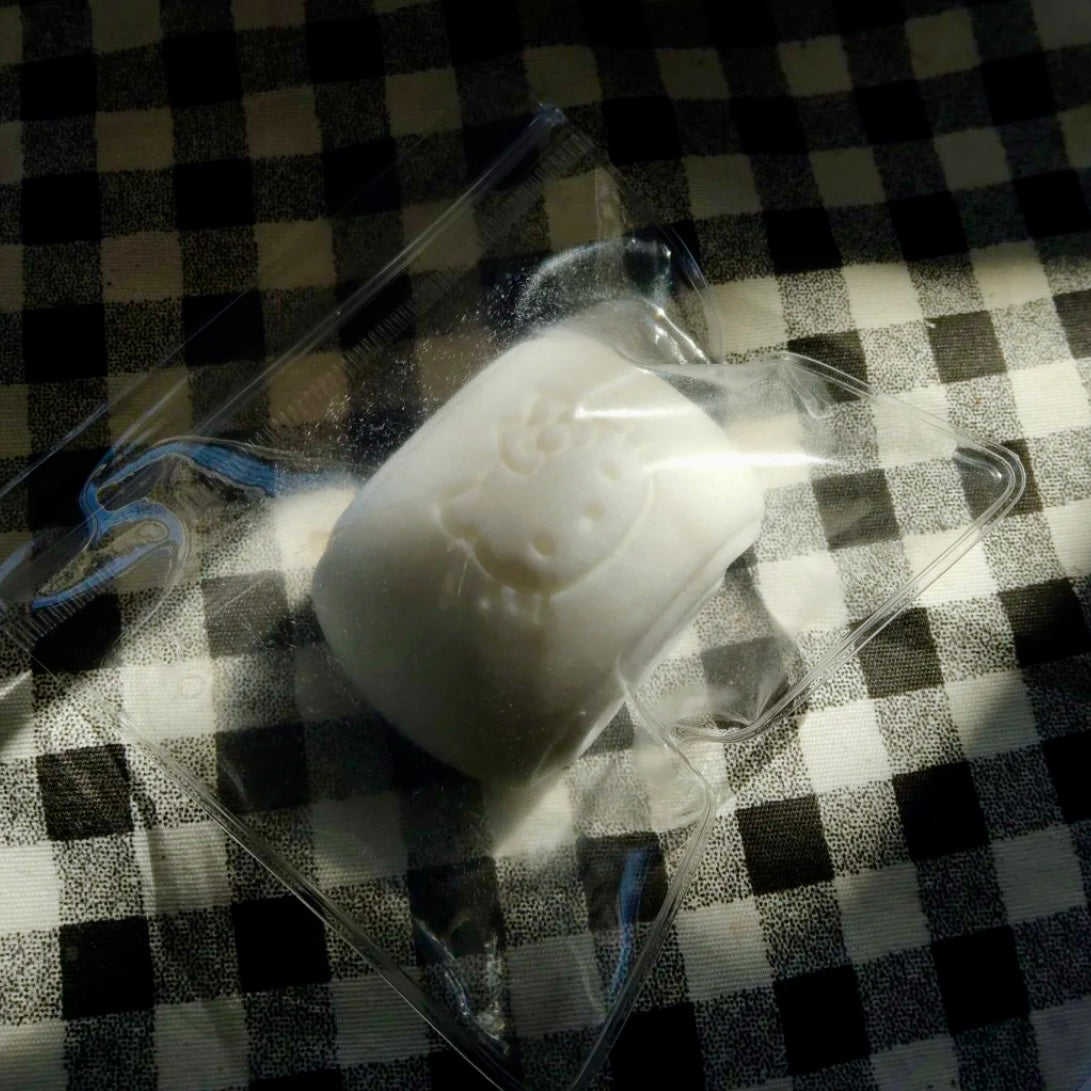 Flocked mini milk kitty bun taba squishy toy (45g)