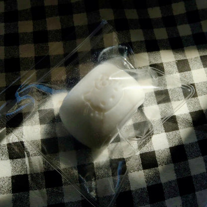 Flocked mini milk kitty bun taba squishy toy (45g)