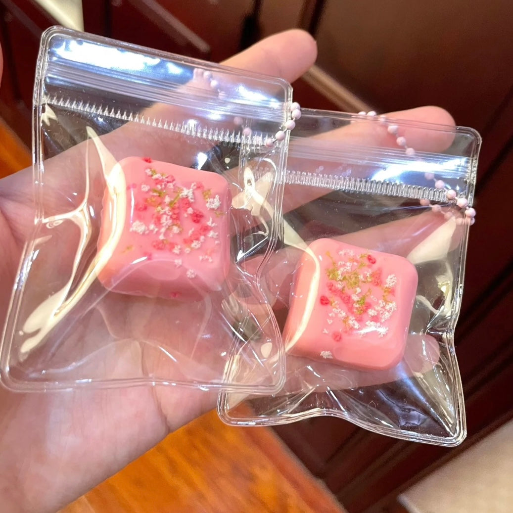 Small Square strawberry/chocolate/yellow/blue taba squishy pendant - Charming Cheese
